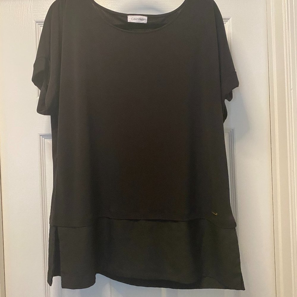 Black dressy blouse with gauze hem